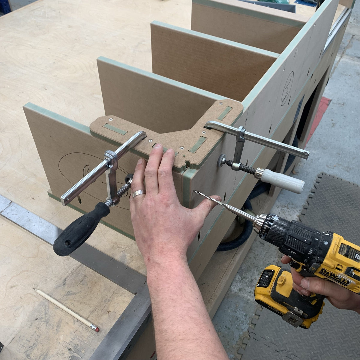 Drilling straight through a clamped corner with a Midi square holding the joint